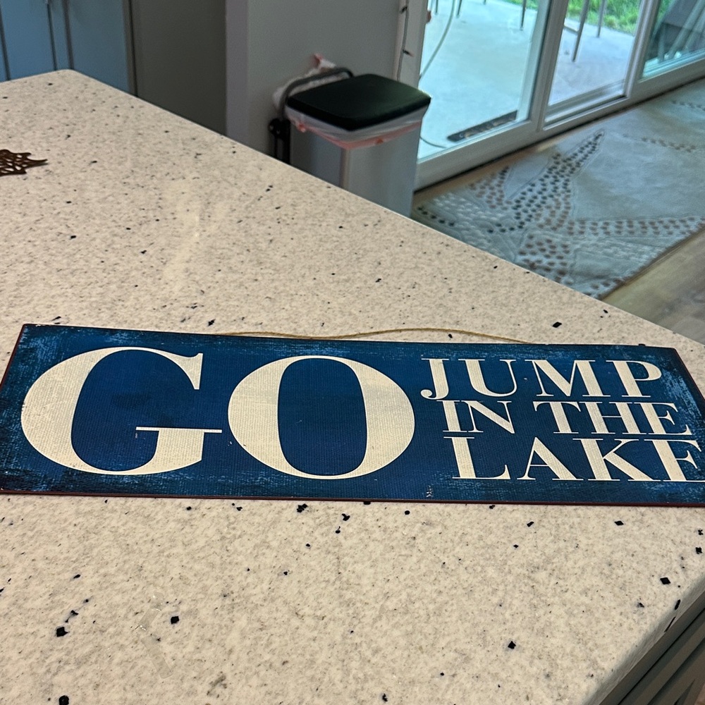 Blue and White Decorative Sign
